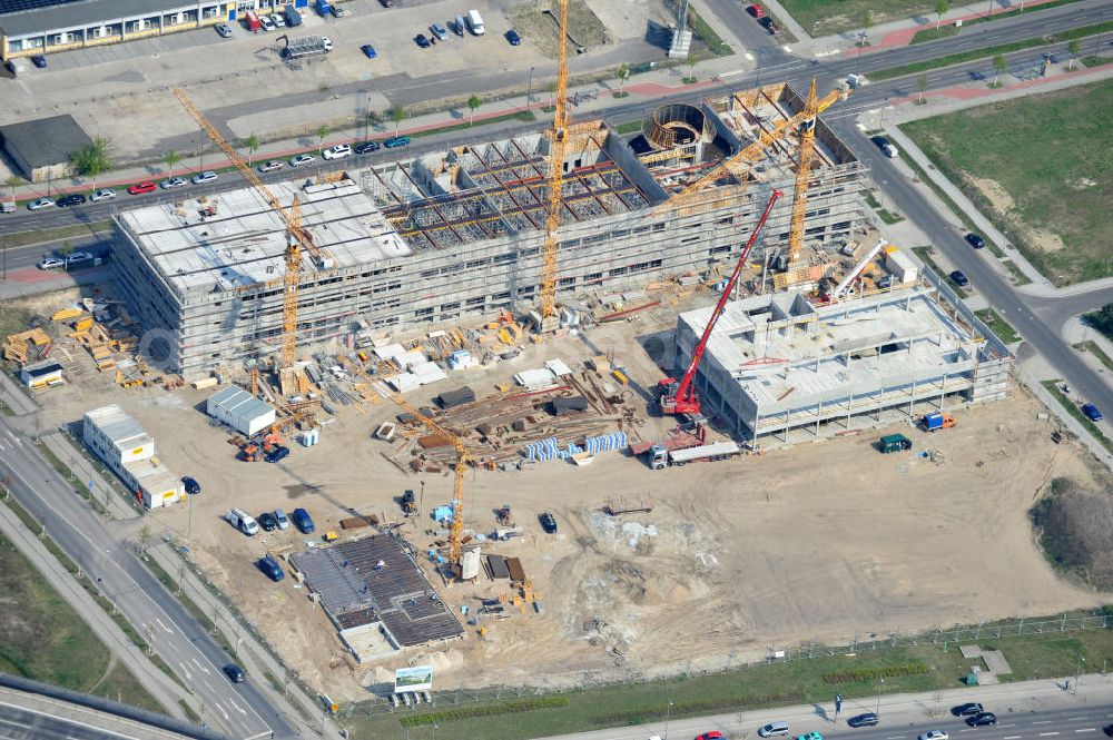 Berlin-Adlershof from the bird's eye view: Neubau des Audi Terminal in Berlin - Adlershof. Die Audi Retail GmbH investiert über 30 Mio Euro, um den Standort zu einem der größten Audi- Zentren in Deutschland auszubauen. Auf über 20.000 Quadratmetern wird ab 2012 der Handelsbetrieb beginnen. Die Baufirma ZÜBLIN errichtet das künftige Flaggschiff der 18 deutschen Audi Terminals. Construction of the Audi Terminal in Berlin - Adlershof.