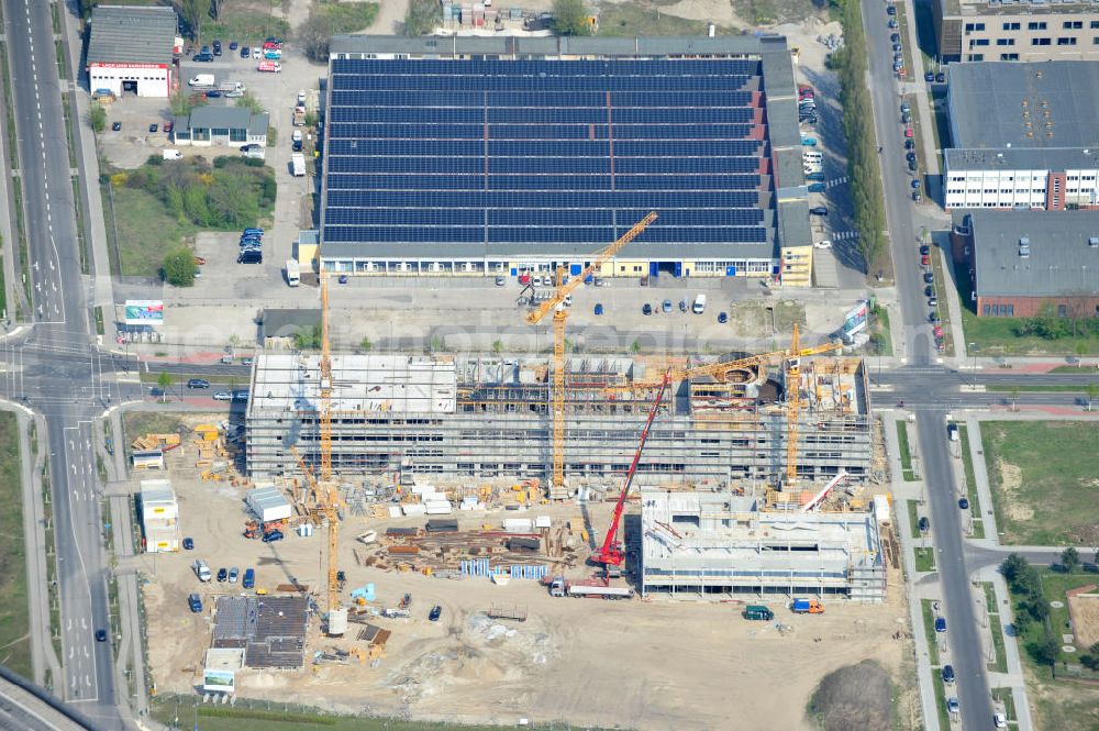 Aerial photograph Berlin-Adlershof - Neubau des Audi Terminal in Berlin - Adlershof. Die Audi Retail GmbH investiert über 30 Mio Euro, um den Standort zu einem der größten Audi- Zentren in Deutschland auszubauen. Auf über 20.000 Quadratmetern wird ab 2012 der Handelsbetrieb beginnen. Die Baufirma ZÜBLIN errichtet das künftige Flaggschiff der 18 deutschen Audi Terminals. Construction of the Audi Terminal in Berlin - Adlershof.