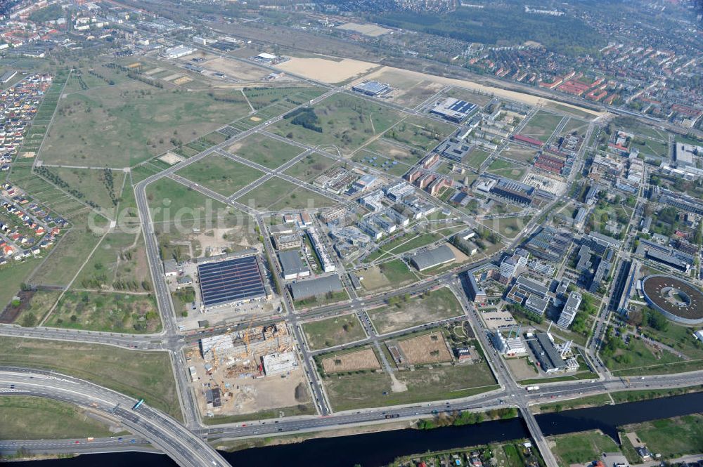 Aerial image Berlin-Adlershof - Neubau des Audi Terminal in Berlin - Adlershof. Die Audi Retail GmbH investiert über 30 Mio Euro, um den Standort zu einem der größten Audi- Zentren in Deutschland auszubauen. Auf über 20.000 Quadratmetern wird ab 2012 der Handelsbetrieb beginnen. Die Baufirma ZÜBLIN errichtet das künftige Flaggschiff der 18 deutschen Audi Terminals. Construction of the Audi Terminal in Berlin - Adlershof.