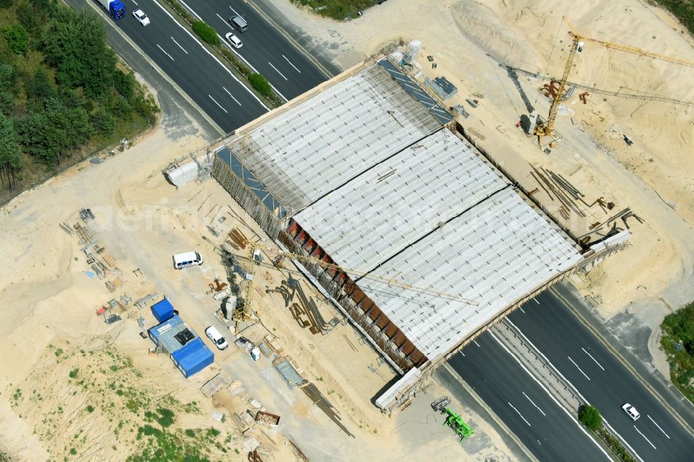 Aerial photograph Beelitz - Construction site of highway bridge structure applied as a wildlife crossing bridge Wild - Wild swap the BAB A 9 through the ARIKON BAU AG in Beelitz in the state Brandenburg, Germany