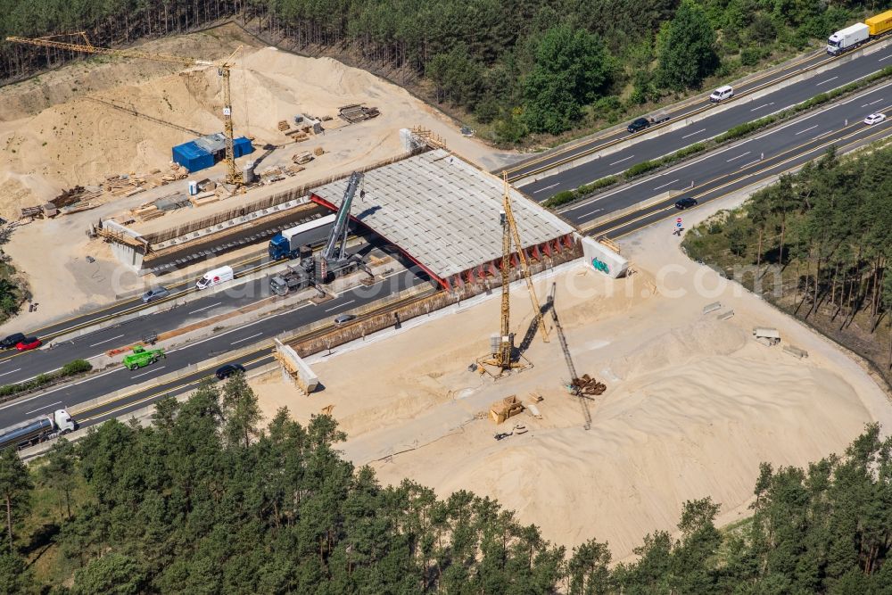 Aerial photograph Beelitz - Construction site of highway bridge structure applied as a wildlife crossing bridge Wild - Wild swap the BAB A 9 through the ARIKON BAU AG in Beelitz in the state Brandenburg, Germany