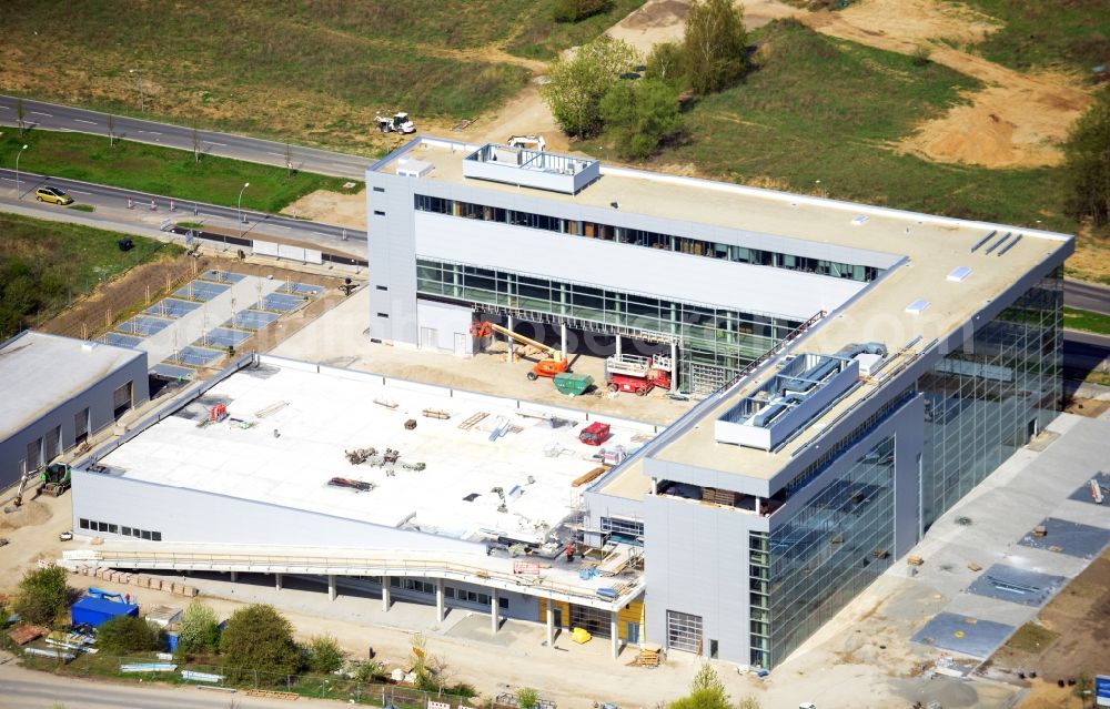 Aerial photograph Schönefeld - Construction site of car dealership building Mercedes-Benz Niederlassung Berlin on Hans-Grade-Allee in Schoenefeld in the state Brandenburg, Germany