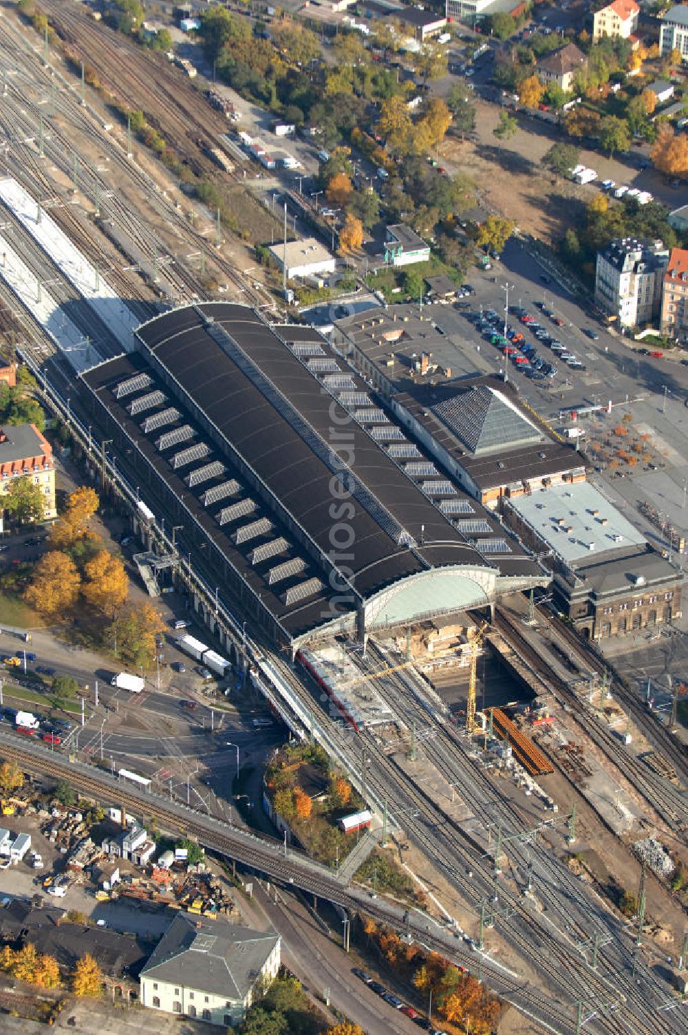 Dresden from the bird's eye view: Blick auf den Neubau der Bahnbrücken am Bahnhof Dresden-Neustadt. Der Bahnhof wurde 1901 Eröffnet, seit dem Jahr 2006 wird der Bahnhof umfassend Aus- und Umgebaut. Bereits Saniert wurde die Bahnhofshalle und die Bahnhofsköpfe. Der Spurplan soll umgelegt und die Brücken erneuert werden. Bis zum Jahr 2014 sollen alle Bauarbeiten abgeschlossen sein. Kontakt: Deutschen Bahn AG, Potsdamer Platz 2, 10785 Berlin, Tel. 01805 / 99 66 33,