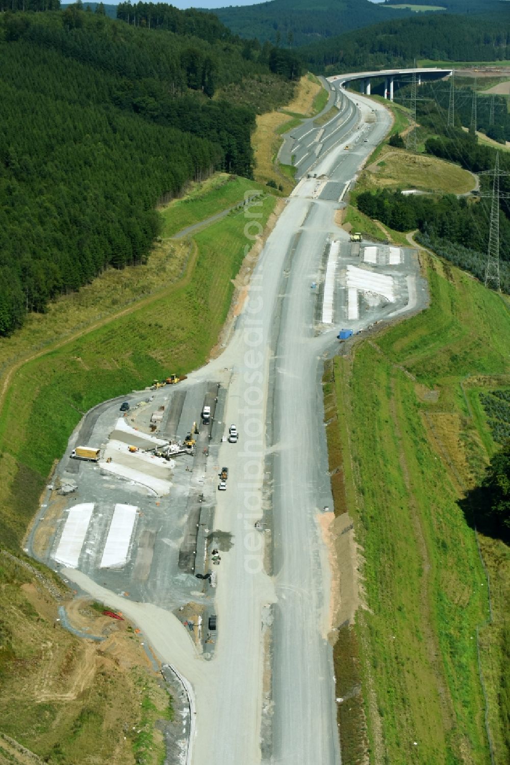 Aerial photograph Bestwig - New construction site of motorway service area and car park along the route and lanes in the course of the federal higway - motorway BAB A46 in Bestwig in the state North Rhine-Westphalia, Germany