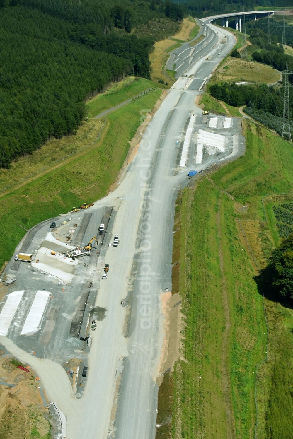 Bestwig from above - New construction site of motorway service area and car park along the route and lanes in the course of the federal higway - motorway BAB A46 in Bestwig in the state North Rhine-Westphalia, Germany