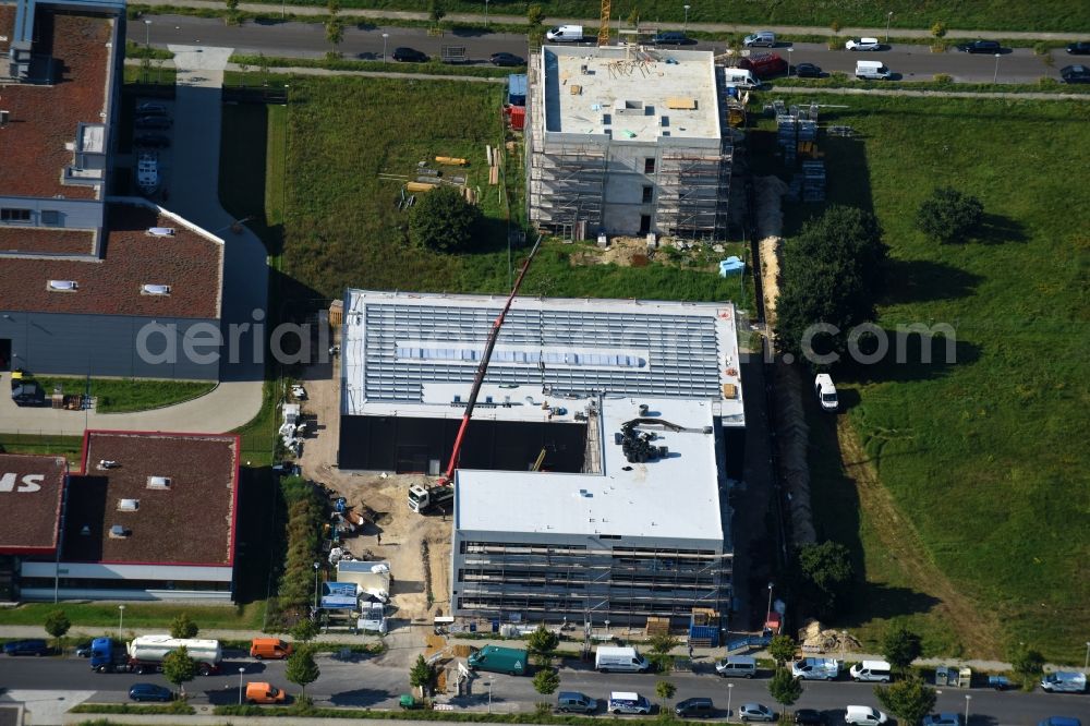 Aerial photograph Berlin - New building construction site in the industrial park on Barbara-McClintock-Strasse corner Herrmann-Dorner-Allee in Berlin, Germany