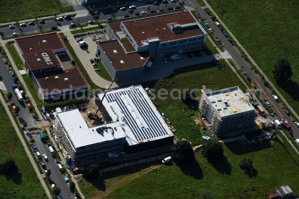 Aerial image Berlin - New building construction site in the industrial park on Barbara-McClintock-Strasse corner Herrmann-Dorner-Allee in Berlin, Germany