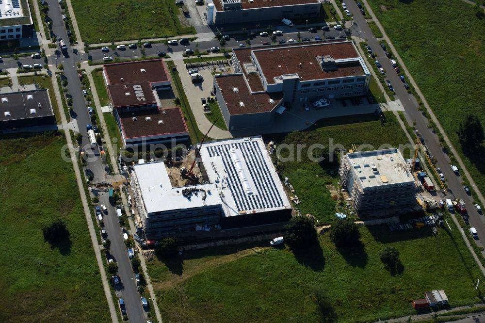 Aerial photograph Berlin - New building construction site in the industrial park on Barbara-McClintock-Strasse corner Herrmann-Dorner-Allee in Berlin, Germany