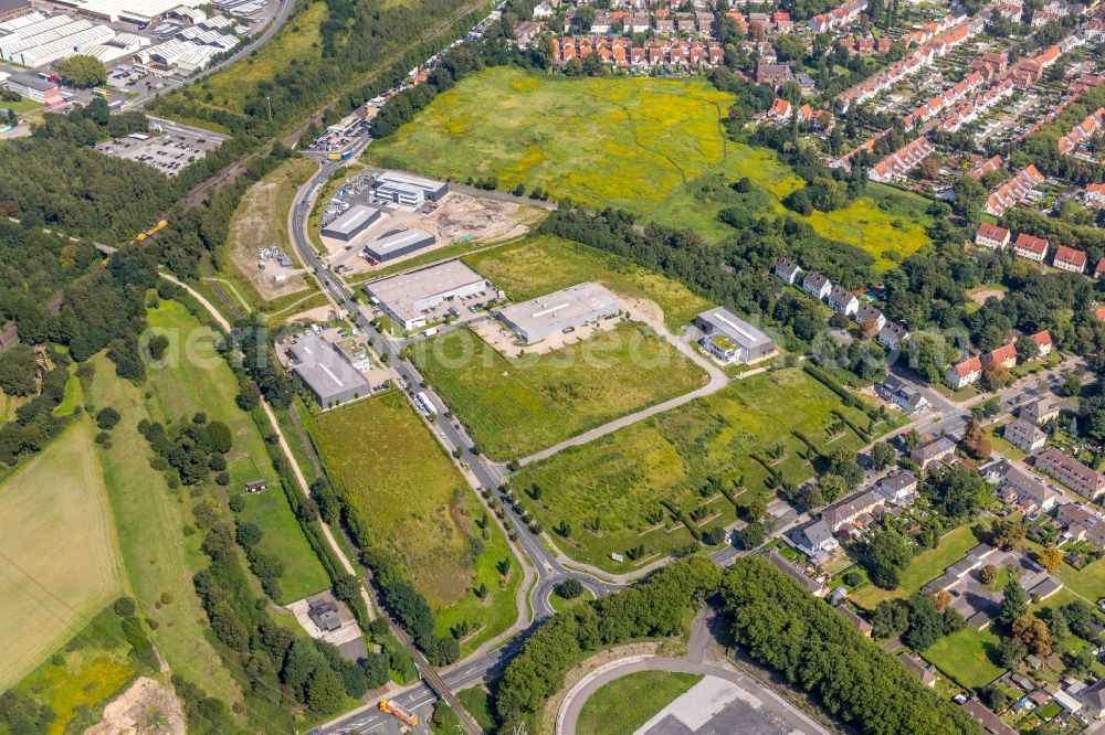 Aerial photograph Essen - New building construction site in the industrial park on Carnaperhof in Essen in the state North Rhine-Westphalia, Germany. The EWG-Essener Wirtschaftsfoerderungs-GmbH develops and markets the Carnaperhof on behalf of the City of Essen