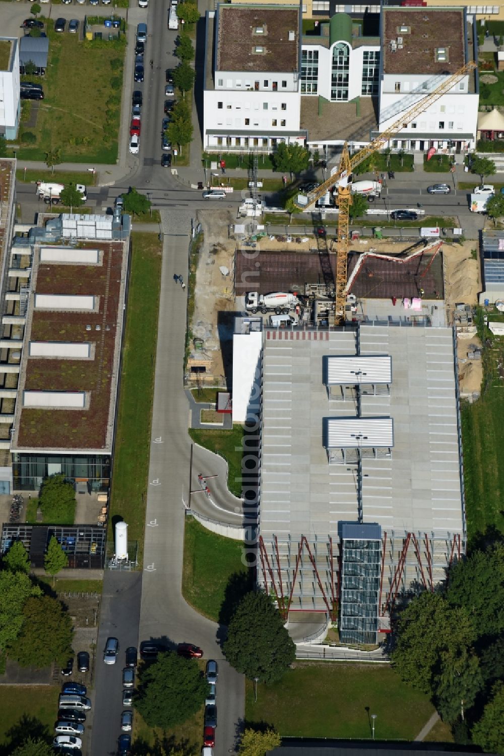 Aerial image Berlin - New building construction site in the industrial park on EUROPA-CENTER Parkhaus Berlin on Albert-Einstein-Strasse in the district Adlershof in Berlin, Germany