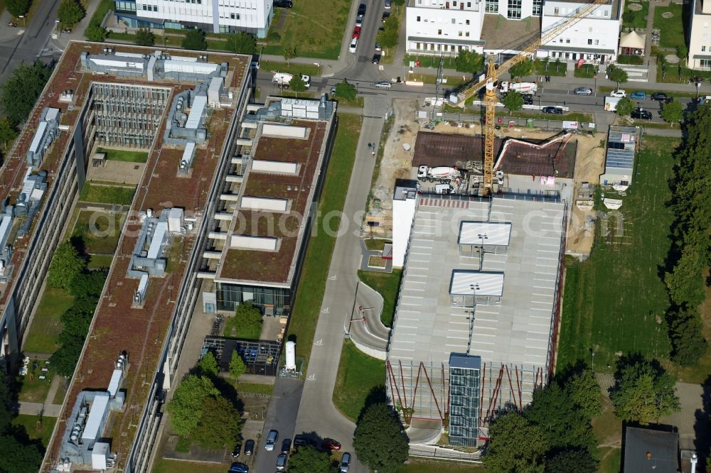 Aerial photograph Berlin - New building construction site in the industrial park on EUROPA-CENTER Parkhaus Berlin on Albert-Einstein-Strasse in the district Adlershof in Berlin, Germany