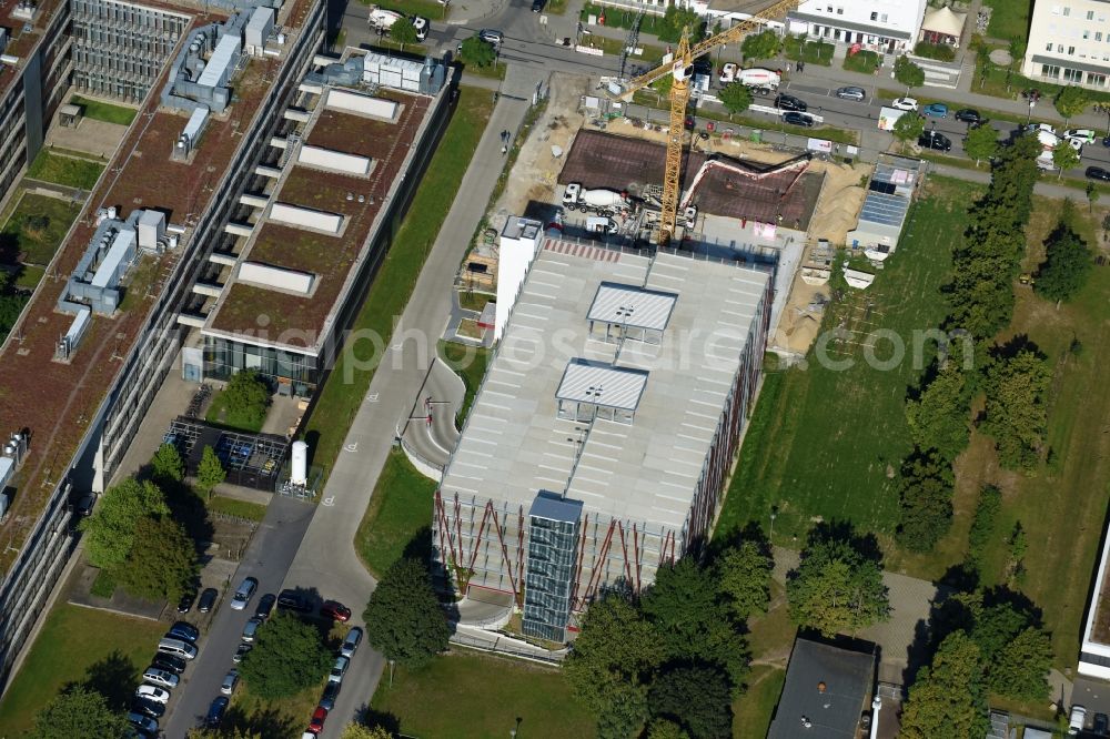 Berlin from above - New building construction site in the industrial park on EUROPA-CENTER Parkhaus Berlin on Albert-Einstein-Strasse in the district Adlershof in Berlin, Germany