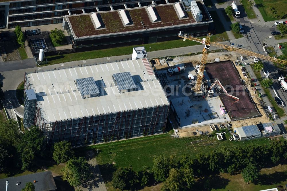 Aerial image Berlin - New building construction site in the industrial park on EUROPA-CENTER Parkhaus Berlin on Albert-Einstein-Strasse in the district Adlershof in Berlin, Germany