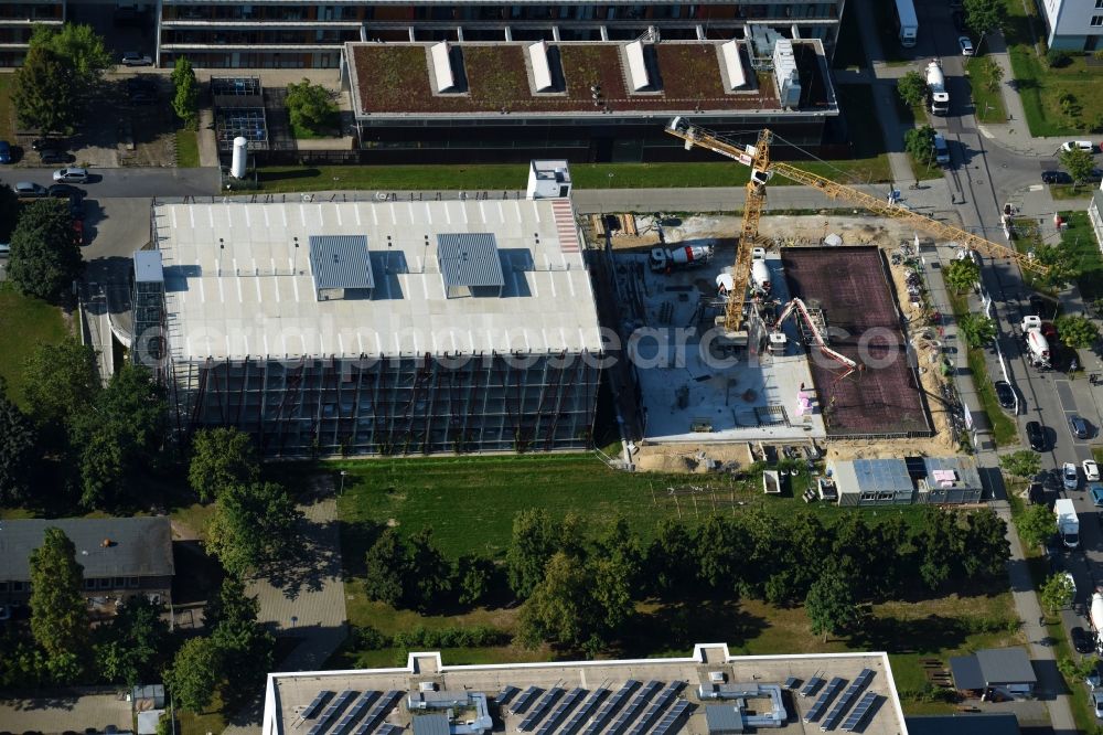 Aerial photograph Berlin - New building construction site in the industrial park on EUROPA-CENTER Parkhaus Berlin on Albert-Einstein-Strasse in the district Adlershof in Berlin, Germany