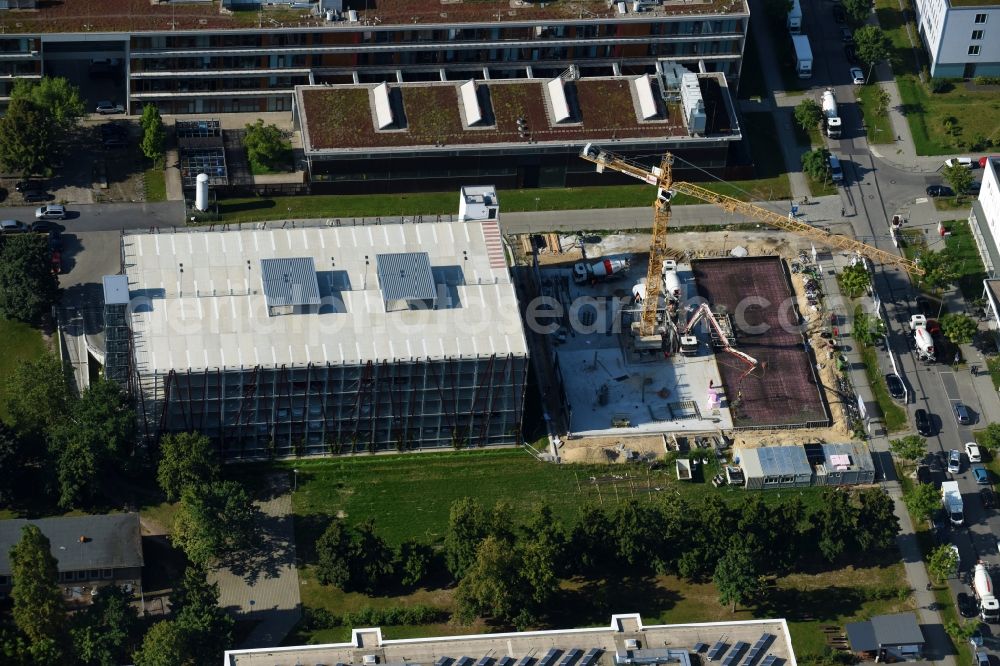 Berlin from above - New building construction site in the industrial park on EUROPA-CENTER Parkhaus Berlin on Albert-Einstein-Strasse in the district Adlershof in Berlin, Germany