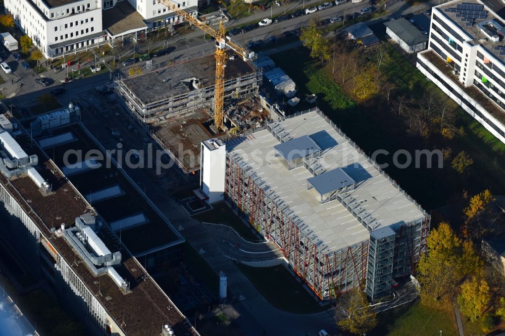 Berlin from the bird's eye view: New building construction site in the industrial park on EUROPA-CENTER Parkhaus Berlin on Albert-Einstein-Strasse in the district Adlershof in Berlin, Germany