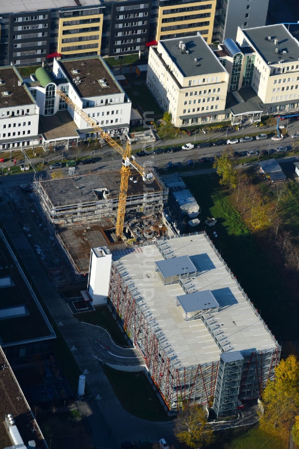 Aerial photograph Berlin - New building construction site in the industrial park on EUROPA-CENTER Parkhaus Berlin on Albert-Einstein-Strasse in the district Adlershof in Berlin, Germany