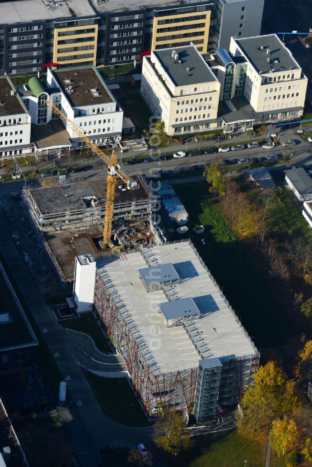 Berlin from above - New building construction site in the industrial park on EUROPA-CENTER Parkhaus Berlin on Albert-Einstein-Strasse in the district Adlershof in Berlin, Germany