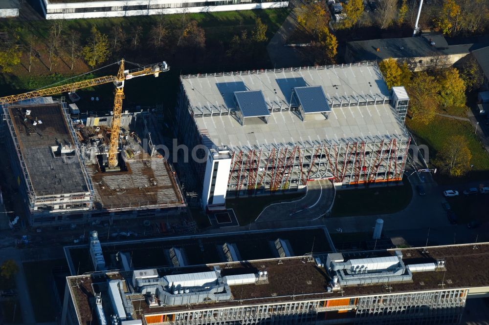 Berlin from above - New building construction site in the industrial park on EUROPA-CENTER Parkhaus Berlin on Albert-Einstein-Strasse in the district Adlershof in Berlin, Germany