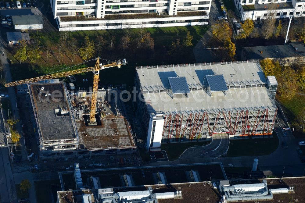 Berlin from the bird's eye view: New building construction site in the industrial park on EUROPA-CENTER Parkhaus Berlin on Albert-Einstein-Strasse in the district Adlershof in Berlin, Germany