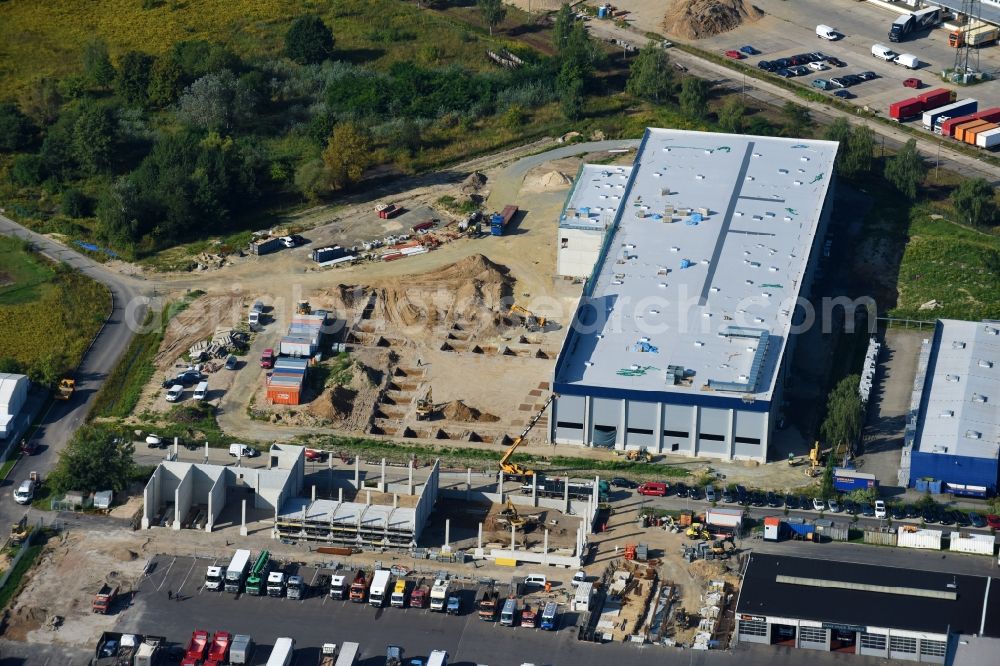 Hoppegarten from the bird's eye view: New building construction site in the industrial park Industriestrasse - Alter Feldweg of Firma coolback GmbH in the district Dahlwitz-Hoppegarten in Hoppegarten in the state Brandenburg, Germany