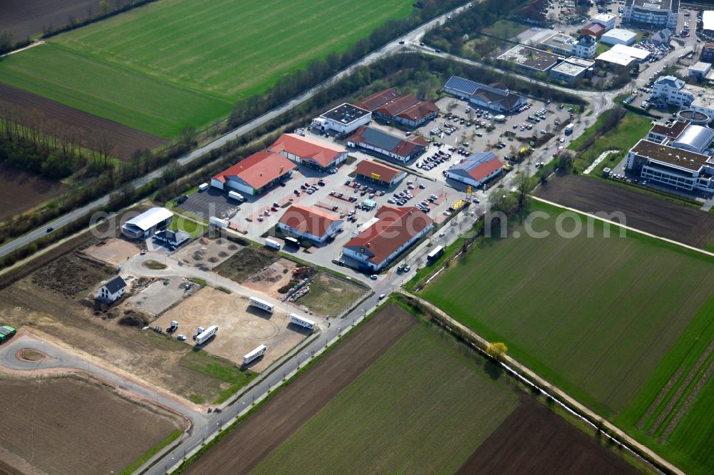 Aerial photograph Bodenheim - New building construction site in the industrial parkLange Ruthe in Bodenheim in the state Rhineland-Palatinate