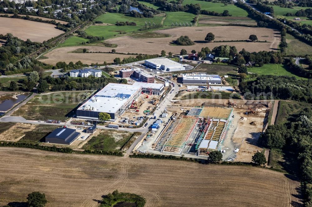 Melsdorf from the bird's eye view: New building construction site in the industrial park Rotenhof in Melsdorf in the state , Germany