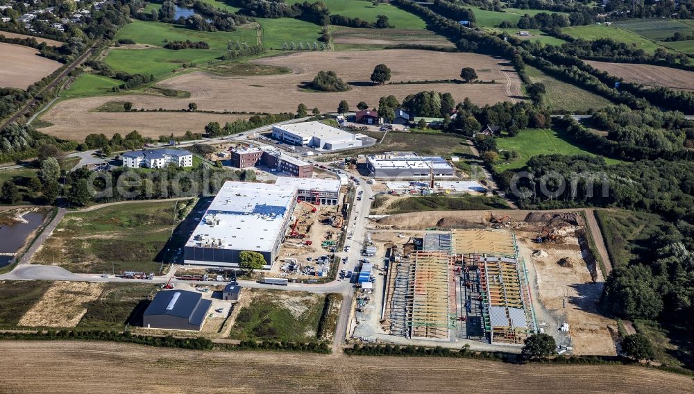 Aerial image Melsdorf - New building construction site in the industrial park Rotenhof in Melsdorf in the state , Germany