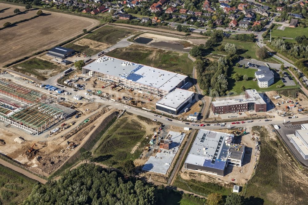 Melsdorf from the bird's eye view: New building construction site in the industrial park Rotenhof in Melsdorf in the state , Germany