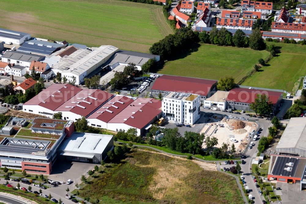 Aerial photograph Schwabach - New building construction site in the industrial park Wiesenstrasse next to the new office building of the RI Immobilienvermittlungs GmbH Roth-Schwabach along the Wiesenstrasse in Schwabach in the state Bavaria, Germany