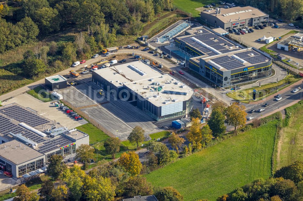 Aerial photograph Dinslaken - New building construction site Porsche Zentrum in the industrial park on street Baerenstrasse - B8 in Dinslaken at Ruhrgebiet in the state North Rhine-Westphalia, Germany