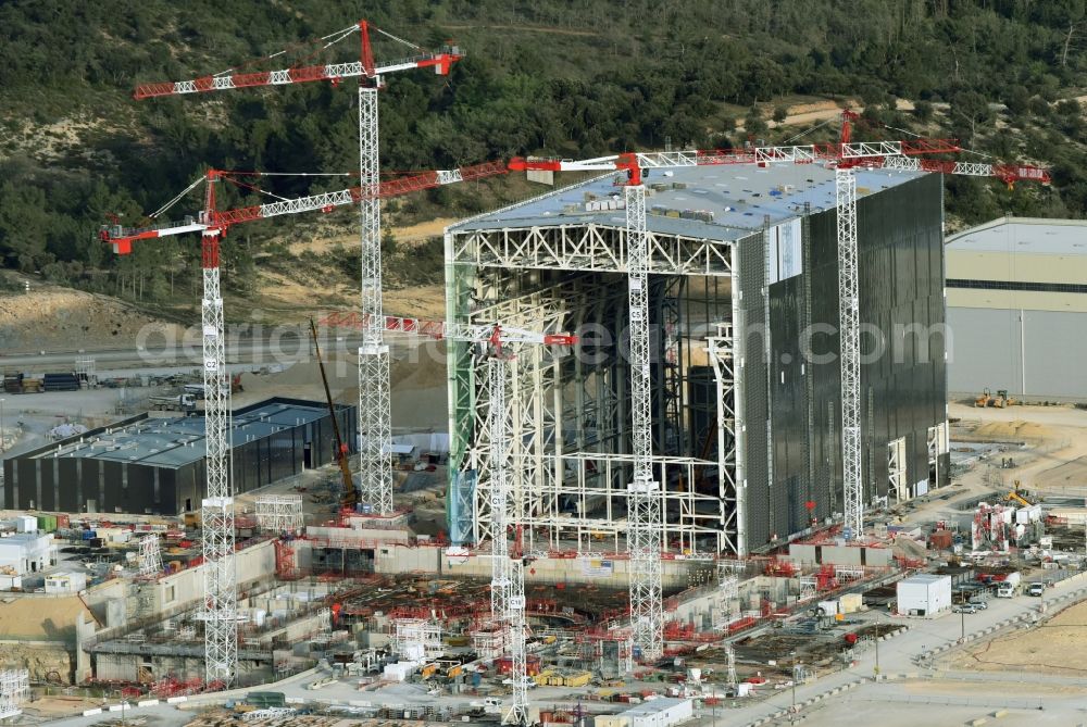 Saint-Paul-lez-Durance from above - Construction site of Building remains of the reactor units and facilities of the NPP nuclear power plant institut CEA Cadarache in Saint-Paul-lez-Durance in Provence-Alpes-Cote d'Azur, France