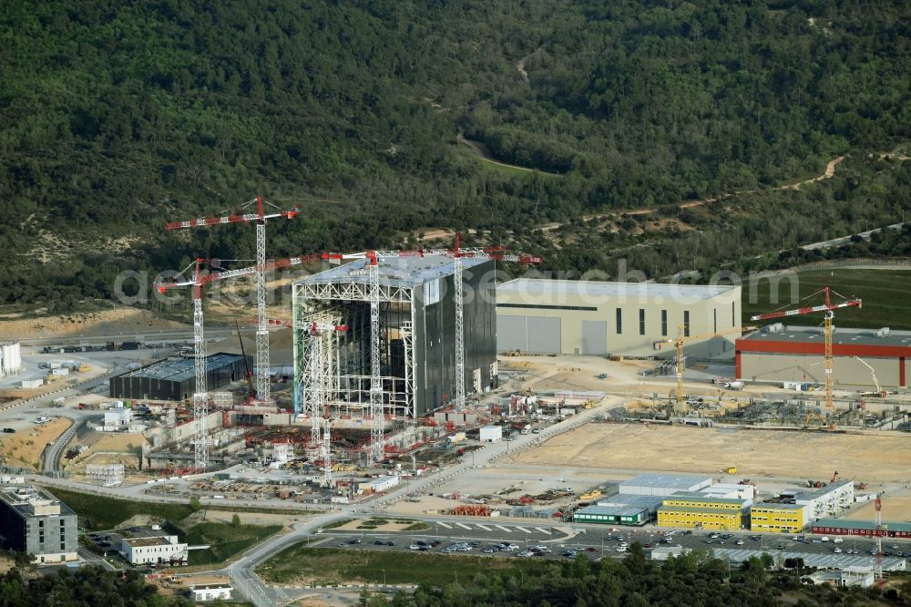 Saint-Paul-lez-Durance from the bird's eye view: Construction site of Building remains of the reactor units and facilities of the NPP nuclear power plant institut CEA Cadarache in Saint-Paul-lez-Durance in Provence-Alpes-Cote d'Azur, France