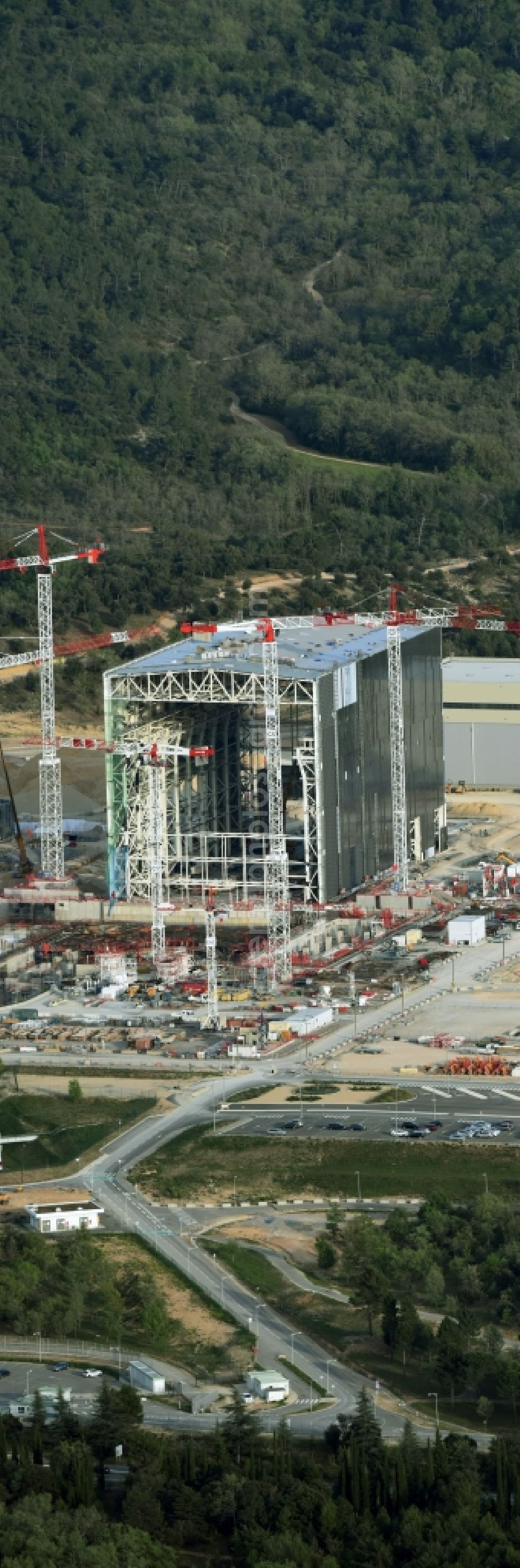 Saint-Paul-lez-Durance from the bird's eye view: Construction site of Building remains of the reactor units and facilities of the NPP nuclear power plant institut CEA Cadarache in Saint-Paul-lez-Durance in Provence-Alpes-Cote d'Azur, France