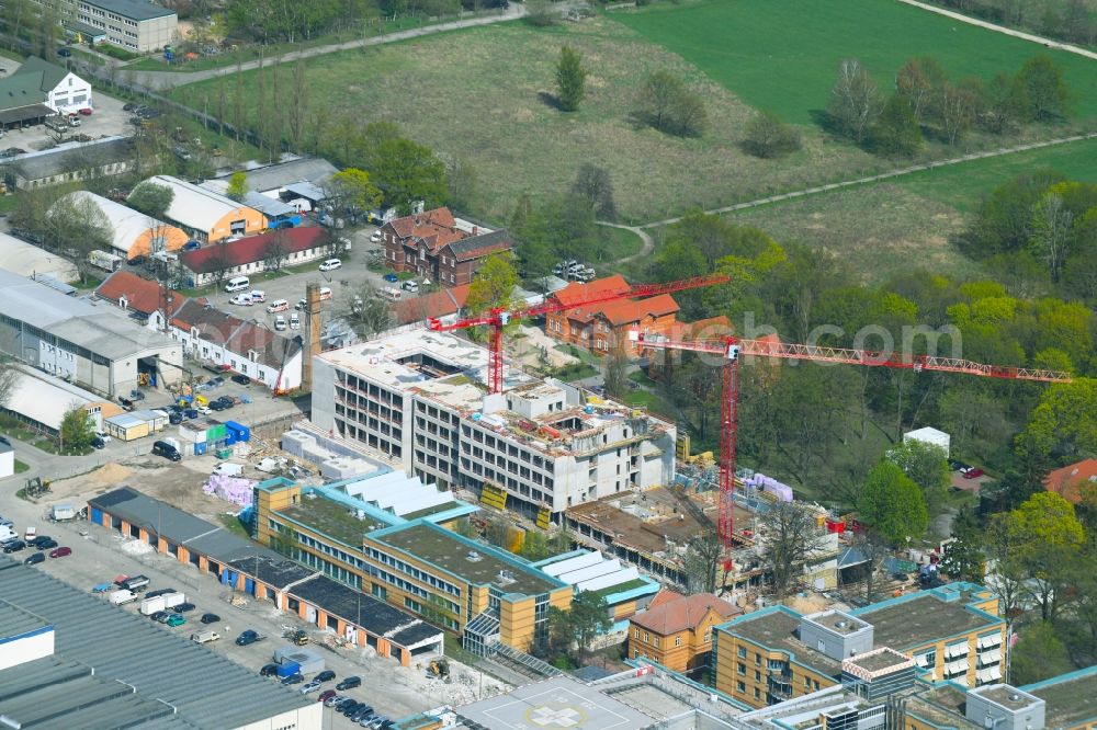 Berlin from the bird's eye view: New construction site for a rehabilitation center of the rehabilitation clinic of BG Klinikum Unfallkrankenhaus Berlin gGmbH in the district Marzahn in Berlin, Germany