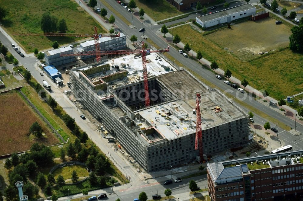 Berlin from the bird's eye view: New construction site Administrative buildings of the state authority Landeslabor Berlin-Brandenburg (LLBB) nach Entwuerfen der kister scheithauer gross architekten und stadtplaner GmbH on Rudower Chaussee corner Wegedornstrasse in the district Adlershof in Berlin