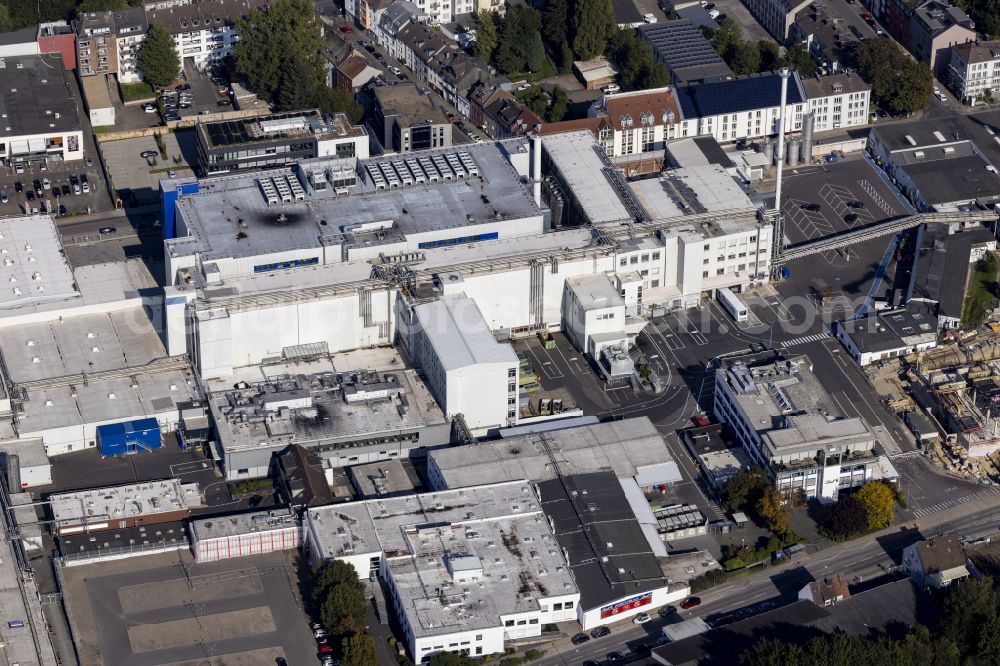 Aachen from above - New construction site for the construction of the administration and production halls on the factory premises of the chocolate manufacturer Lindt & Spruengli on Suesterfeldstrasse in the district Hastenrath in Aachen in the state of North Rhine-Westphalia, Germany