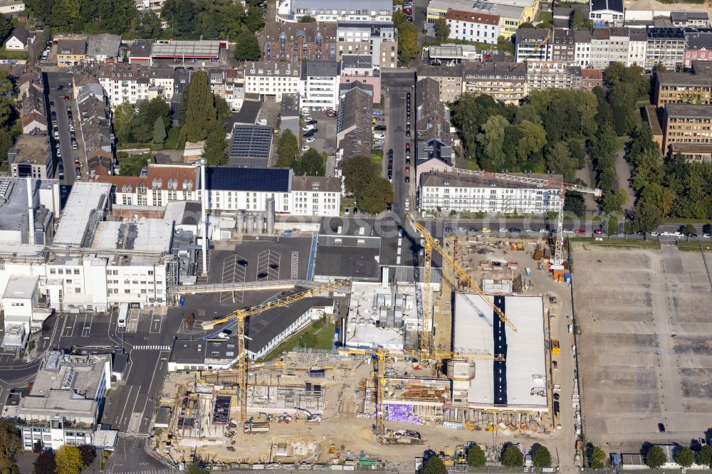 Aachen from the bird's eye view: New construction site for the construction of the administration and production halls on the factory premises of the chocolate manufacturer Lindt & Spruengli on Suesterfeldstrasse in the district Hastenrath in Aachen in the state of North Rhine-Westphalia, Germany