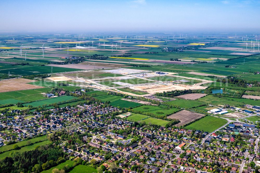 Aerial image Lohe-Rickelshof - New building - construction site of the Northvolt factory premises in Lohe-Rickelshof battery cell manufacturer as a gigafactory for the automotive industry in the state Schleswig-Holstein, Germany