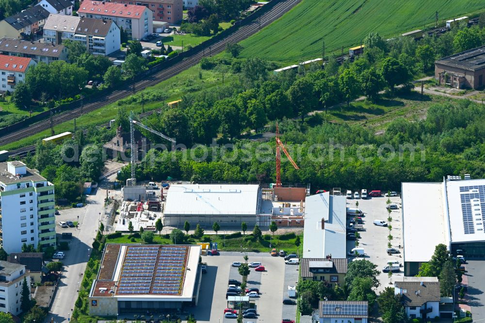 Schwetzingen from the bird's eye view: New building - construction site on the factory premises of Notion Systems GmbH on street Werkstrasse in the district Rheinau in Schwetzingen in the state Baden-Wuerttemberg, Germany