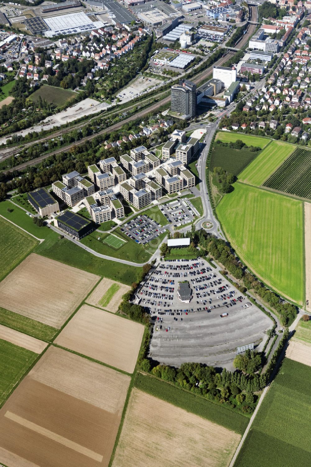 Kornwestheim from the bird's eye view: New building - construction site on the factory premises of the Wuestenrot campus of the Wuestenrot & Wuerttembergische AG on Ludwigsburger Strasse - Hohenzollernstrasse in Kornwestheim in the state Baden-Wuerttemberg, Germany