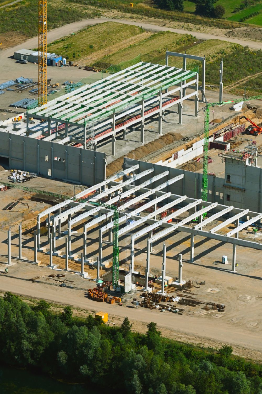 Aerial photograph Weeze - New construction site for the construction of buildings and production halls on the factory premises for the production of heavy corrugated cardboard on the street Am Sandthof in the district of Goch in Weeze in the federal state of North Rhine-Westphalia, Germany