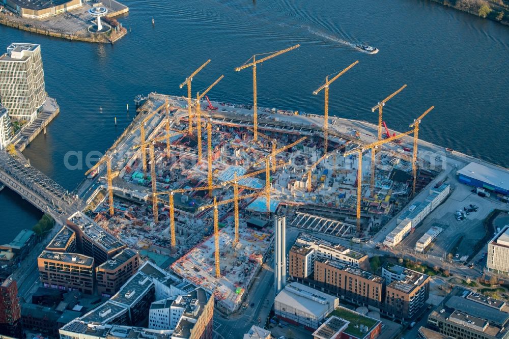 Aerial image Hamburg - Construction site for the new building complex of the shopping center at Ueberseequartier at Chicagokai - Osakaallee in the area of the former Grasbrooks in the Hafencity district in Hamburg, Germany