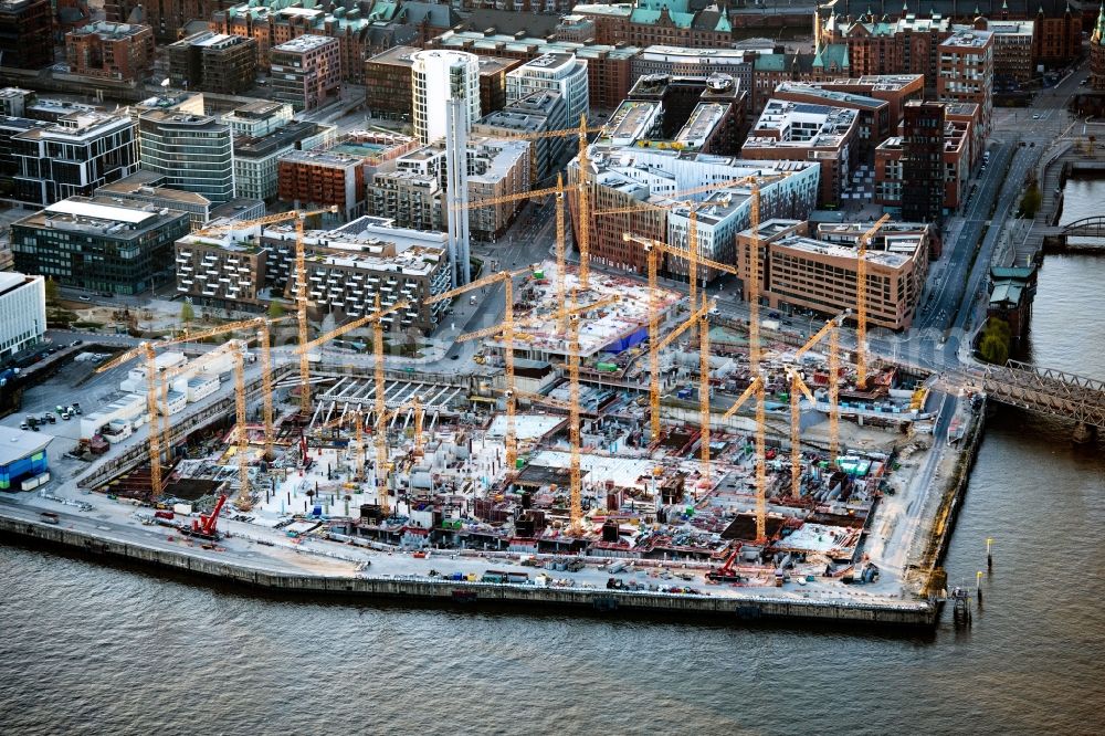 Aerial photograph Hamburg - Construction site for the new building complex of the shopping center at Ueberseequartier at Chicagokai - Osakaallee in the area of the former Grasbrooks in the Hafencity district in Hamburg, Germany