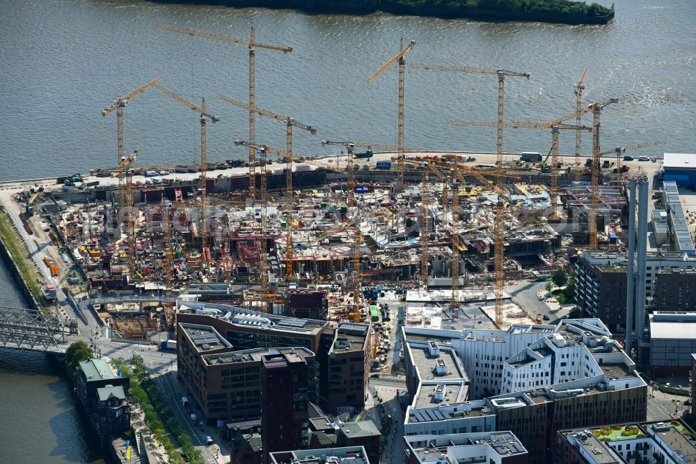 Aerial image Hamburg - Construction site for the new building complex of the shopping center at Ueberseequartier at Chicagokai - Osakaallee in the area of the former Grasbrooks in the Hafencity district in Hamburg, Germany