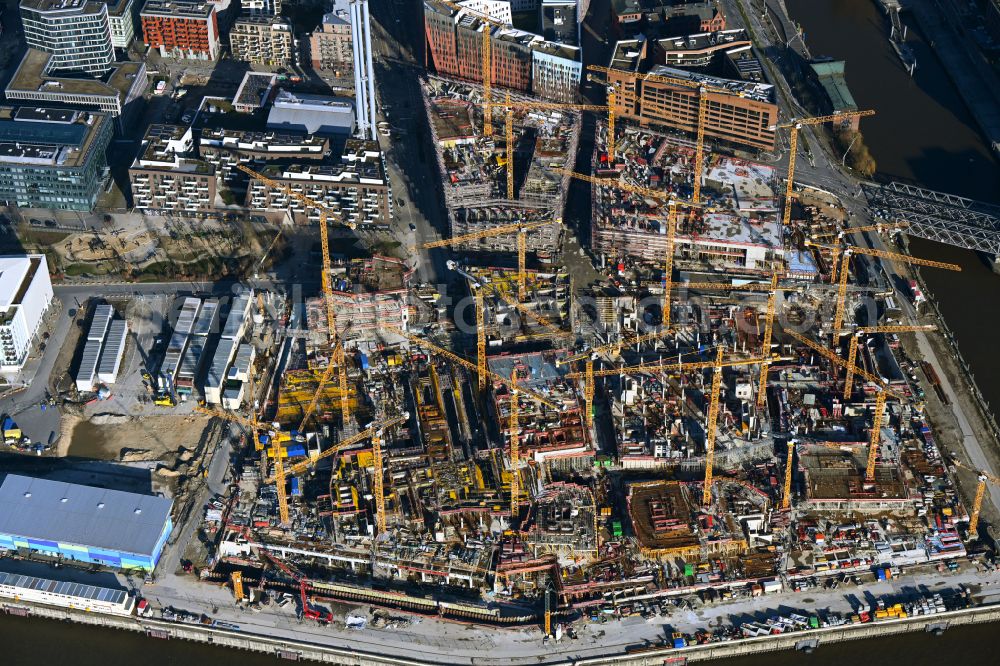 Aerial image Hamburg - Construction site for the new building complex of the shopping center at Ueberseequartier at Chicagokai - Osakaallee in the area of the former Grasbrooks in the Hafencity district in Hamburg, Germany