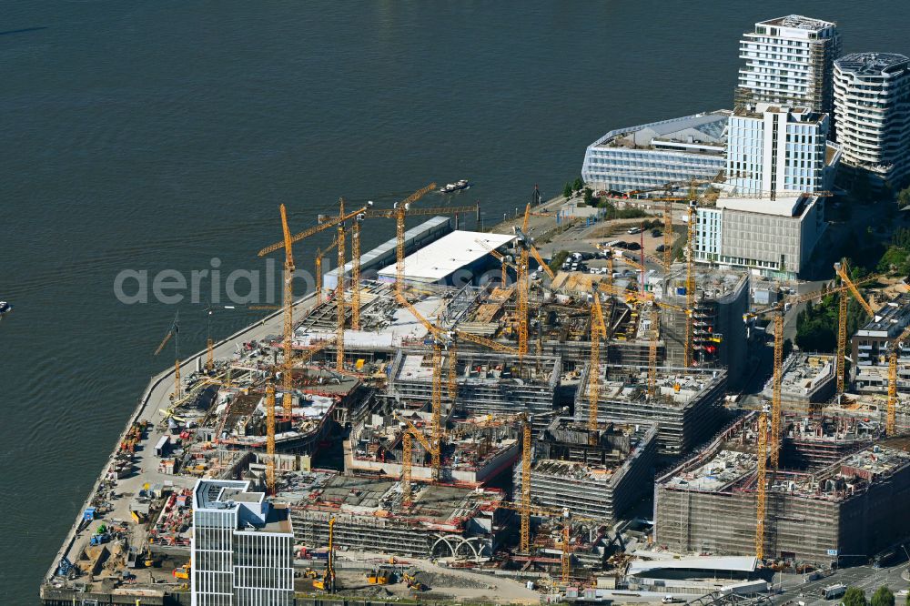 Aerial photograph Hamburg - Construction site for the new building complex of the shopping center at Ueberseequartier at Chicagokai - Osakaallee in the area of the former Grasbrooks in the Hafencity district in Hamburg, Germany