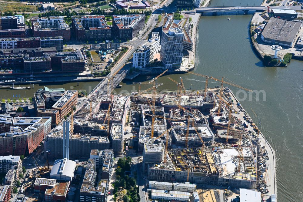 Aerial image Hamburg - Construction site for the new building complex of the shopping center at Ueberseequartier at Chicagokai - Osakaallee in the area of the former Grasbrooks in the Hafencity district in Hamburg, Germany