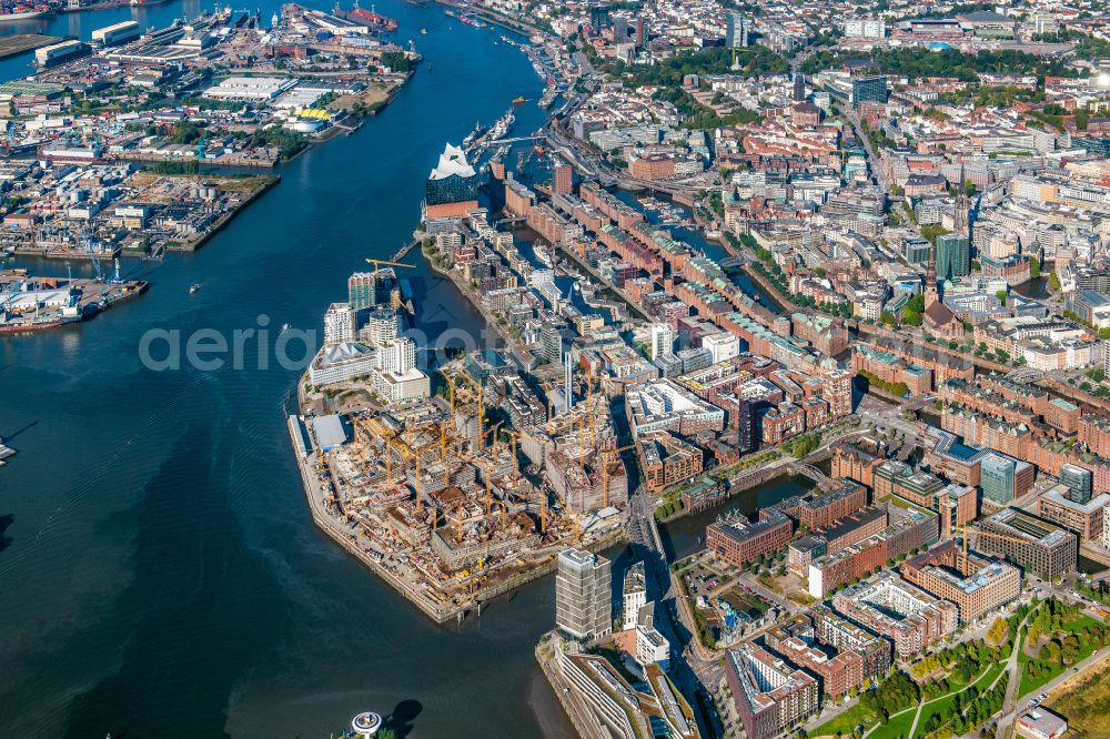 Hamburg from the bird's eye view: Construction site for the new building complex of the shopping center at Ueberseequartier at Chicagokai - Osakaallee in the area of the former Grasbrooks in the Hafencity district in Hamburg, Germany