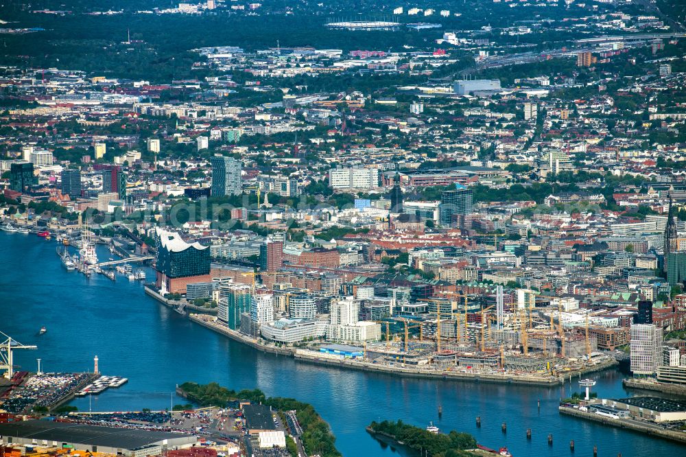 Hamburg from the bird's eye view: Construction site for the new building complex of the shopping center at Ueberseequartier at Chicagokai - Osakaallee in the area of the former Grasbrooks in the Hafencity district in Hamburg, Germany